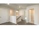 Upstairs hallway with multiple doors and wood-look floors at 4074 Fairlady Ct, Kennesaw, GA 30144