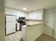 Galley kitchen with stainless steel appliances at 1086 Heathmoor Ct, Norcross, GA 30093