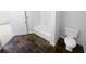 Bathroom with bathtub, toilet and slate floor at 4279 Orchard Grv, Stone Mountain, GA 30083