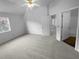 Spacious bedroom with carpet flooring and access to bathroom and closet at 4279 Orchard Grv, Stone Mountain, GA 30083