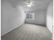 Bright bedroom with carpet and a window at 4279 Orchard Grv, Stone Mountain, GA 30083