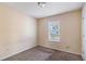 Small bedroom with neutral walls and carpet flooring at 2326 Chestnut Log Dr, Lithia Springs, GA 30122