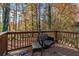 Wooden deck with wooded backyard view at 2326 Chestnut Log Dr, Lithia Springs, GA 30122