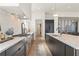 Modern kitchen with stainless steel appliances and marble countertops at 245 Roycroft Ln, Fayetteville, GA 30214