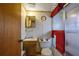 Simple bathroom with shower/tub combo, single vanity, and wood cabinetry at 2948 Lenora Rd, Snellville, GA 30039