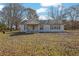 Single-story home with covered front porch and large front yard at 2948 Lenora Rd, Snellville, GA 30039