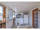 Laundry room with washer, dryer, and storage cabinets at 2948 Lenora Rd, Snellville, GA 30039