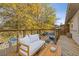 Private deck with wooden furniture and a view of the surrounding trees at 24 Daniel Se St # 12, Atlanta, GA 30312