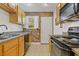 Eat-in kitchen with exposed brick wall and granite counters at 24 Daniel Se St # 12, Atlanta, GA 30312