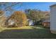 Spacious backyard with a storage shed and wooden deck at 2631 Godfrey Nw Dr, Atlanta, GA 30318
