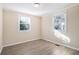 Empty bedroom with ample natural light and wood-look floors at 2631 Godfrey Nw Dr, Atlanta, GA 30318