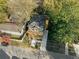 Aerial view of a two-story house with a large deck and driveway at 60 Newcastle Sw St, Atlanta, GA 30314