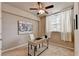 Home office with desk and ceiling fan at 1257 Park Pass Way, Suwanee, GA 30024