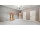 Spacious bedroom with ample closet space and ceiling fan at 22 Spring Lake Trl, White, GA 30184