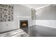 Living room with fireplace and built-in bookcases at 2769 Peachtree Ne Rd # 10, Atlanta, GA 30305