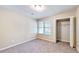 Spacious bedroom with neutral walls, carpet, and a closet at 2494 Padens Chase Way, Lawrenceville, GA 30044