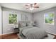 Light and airy bedroom with hardwood floors and ceiling fan at 1772 Mackinaw Se, Smyrna, GA 30080