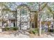 Two-story townhome with gray siding, stone accents, and a two-car garage at 510 Jefferson Chase St, Atlanta, GA 30354