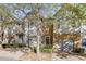 Two-story townhome with gray siding, stone accents, and a two-car garage at 510 Jefferson Chase St, Atlanta, GA 30354