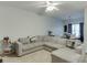 L-shaped sectional sofa anchors this living room, open to dining area at 510 Jefferson Chase St, Atlanta, GA 30354