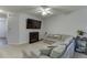Spacious living room featuring a cozy fireplace and comfortable sectional sofa at 510 Jefferson Chase St, Atlanta, GA 30354