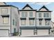 Three-story townhouses with two-car garages at 2587 Ocean Walk Nw Dr, Atlanta, GA 30318