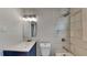 Modern bathroom with marble-tiled shower and vanity at 1864 Pinedale Pl, Decatur, GA 30032