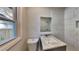 Updated bathroom with granite vanity and marble tile shower at 1864 Pinedale Pl, Decatur, GA 30032