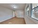 Light-filled bedroom, featuring wood-look floors and an open layout at 1864 Pinedale Pl, Decatur, GA 30032