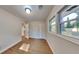 Bright bedroom with wood-look floors and ample natural light at 1864 Pinedale Pl, Decatur, GA 30032