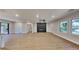 Spacious living room featuring hardwood floors and a modern fireplace at 1864 Pinedale Pl, Decatur, GA 30032