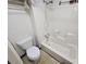 Bathroom with shower/tub combo, toilet, and tiled floor at 43 Gammon Se Ave, Atlanta, GA 30315