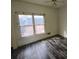 Spacious bedroom with large window and new flooring at 43 Gammon Se Ave, Atlanta, GA 30315