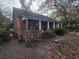 Brick home with covered porch and side yard at 43 Gammon Se Ave, Atlanta, GA 30315