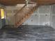 Unfinished interior with wood floors and stairs at 43 Gammon Se Ave, Atlanta, GA 30315