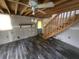 Unfinished interior with wood floors and stairs at 43 Gammon Se Ave, Atlanta, GA 30315