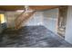 Unfinished interior with wood floors and stairs at 43 Gammon Se Ave, Atlanta, GA 30315