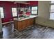 Kitchen with dark gray vinyl flooring and island at 43 Gammon Se Ave, Atlanta, GA 30315