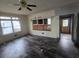 Living Room with laminate flooring, ceiling fan, and large window at 43 Gammon Se Ave, Atlanta, GA 30315