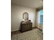 Charming bedroom with dresser and patterned rug at 247 Ivey Ter # 45, Temple, GA 30179