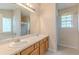 Double vanity bathroom with a shower and bathtub at 5439 Village Rdg, Fairburn, GA 30213