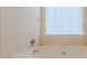 Bathroom with bathtub and window for natural light at 5439 Village Rdg, Fairburn, GA 30213