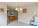 Dining room with access to kitchen and view of living room at 5439 Village Rdg, Fairburn, GA 30213