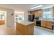 Kitchen with an island and modern appliances at 5439 Village Rdg, Fairburn, GA 30213