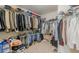 Large walk-in closet with ample hanging space and shelving at 5439 Village Rdg, Fairburn, GA 30213