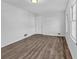 Large bedroom with two doors and new wood-look floors at 2080 Bluffton Way, Decatur, GA 30035