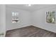 Spacious bedroom with wood-look floors and neutral walls, ready for customization at 2080 Bluffton Way, Decatur, GA 30035