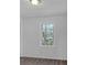 Simple bedroom with hardwood floors and a window at 2080 Bluffton Way, Decatur, GA 30035