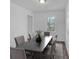 Elegant dining room with hardwood floors and a large table at 2080 Bluffton Way, Decatur, GA 30035