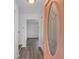 Bright entryway with coral door and view into the living room at 2080 Bluffton Way, Decatur, GA 30035